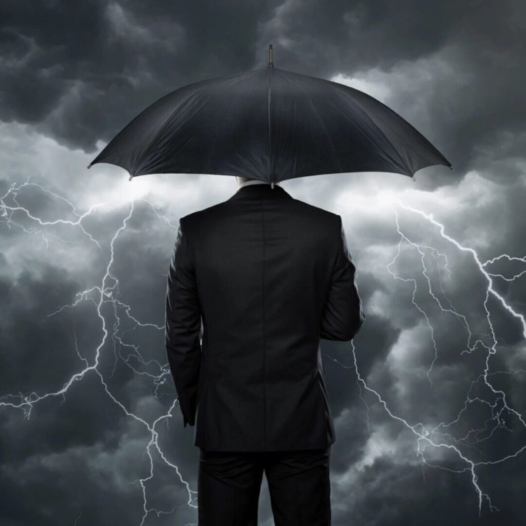 A man in a suit holding an umbrella under a stormy sky with lightning.