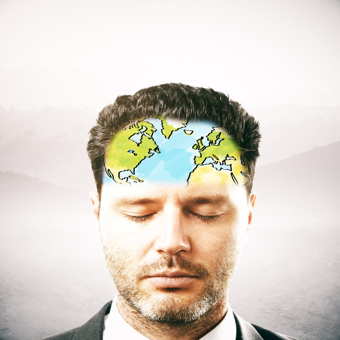 Man with a cracked earth illustration on his forehead symbolizing mental strain.